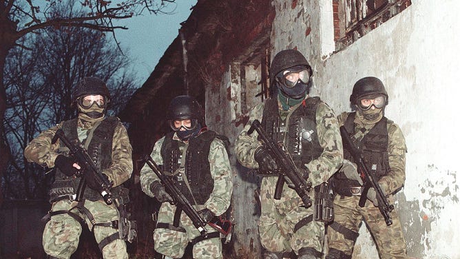 397722 01: Members of the highly trained Polish commando group GROM conduct training exercises November 22, 2001 in Poland. The secretive special missions group will most likely be sent to Afghanistan. (Photo by Jasiek/Getty Images)
