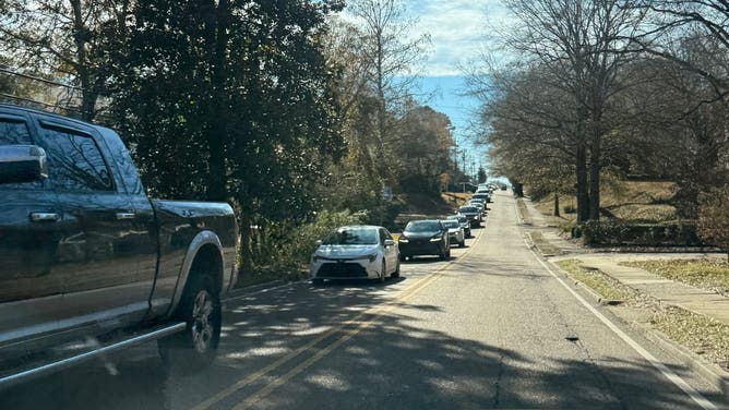 Ole Miss fans head into downtown Oxford ahead of the CFP weekend.