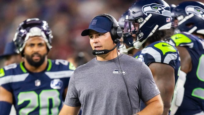 Seattle Seahawks head coach Mike Macdonald on the sideline during a game against the Arizona Cardinals at State Farm Stadium.