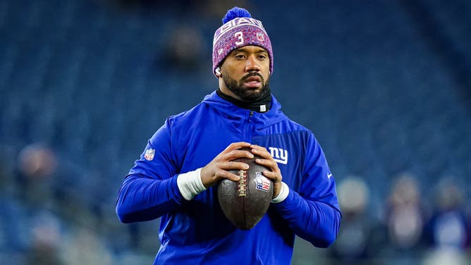 New York Giants quarterback Russell Wilson warms up before a game.