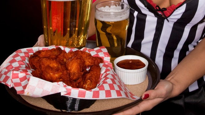 Australian couple walks into Twin Peaks in Texas is surrounded by ass