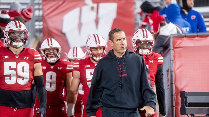 Wisconsin Badgers head coach Luke Fickell leads the Wisconsin Badgers onto the field before playing the Illinois Fighting Illini at Camp Randall Stadium in Madison, Wisconsin, on November 22, 2025. (Photo by Ross Harried/NurPhoto via Getty Images)