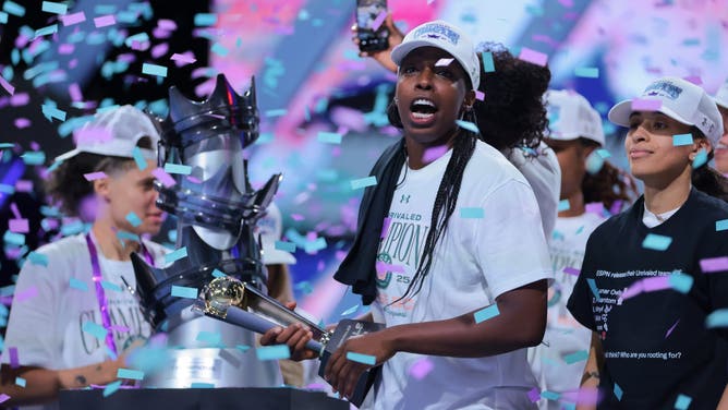 Rose BC guard Chelsea Gray celebrates after winning the MVP trophy during the Unrivaled Championship game against the Vinyl BC at Wayfair Arena.