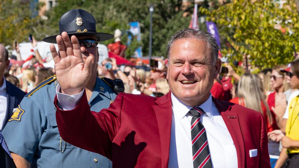 Arkansas head coach Sam Pittman enjoys a cold beer and Popeyes chicken on his perfect day