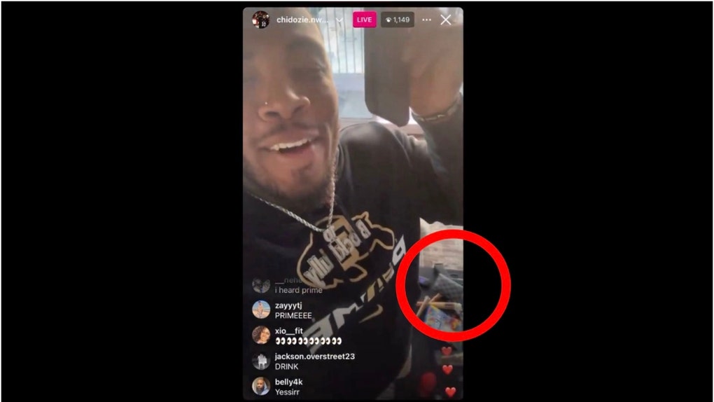 Chidozie Nwankwo appears to flash gun in the background during commitment video to Colorado. (Credit: Screenshot/X Video https://twitter.com/recruitralphie/status/1736871370339090486)