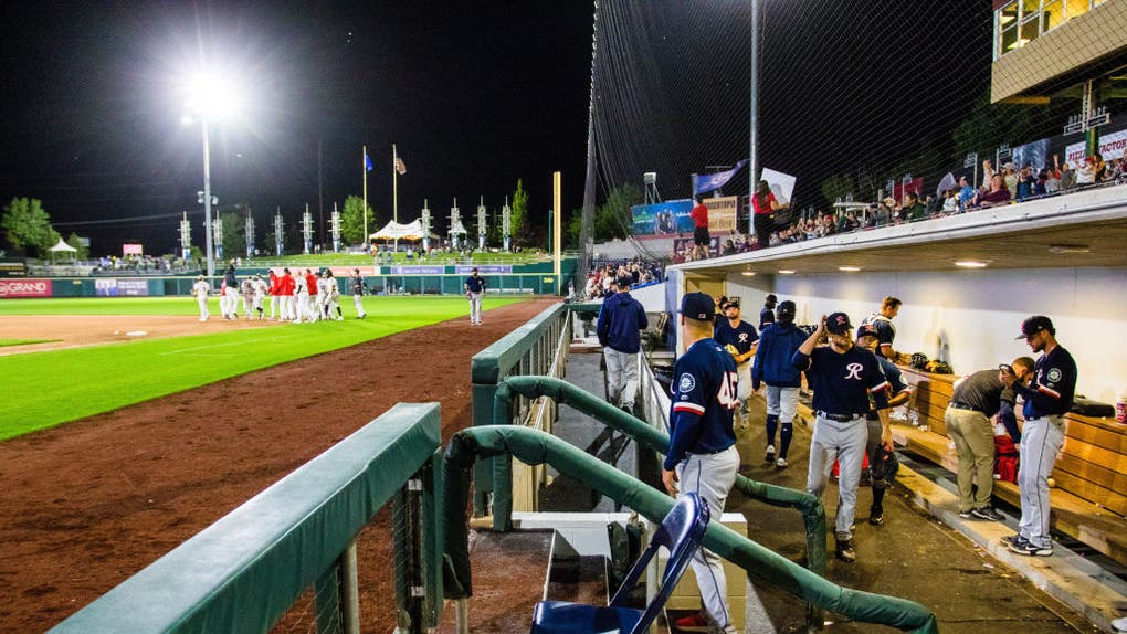 96f1b2d7-The Reno Aces celebrate a win while the Tacoma Rainiers pack