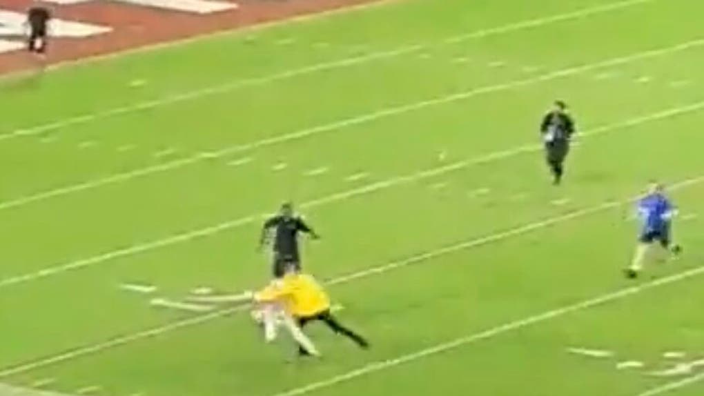 An Alabama Security officer tackled a fan who rushed an empty field following win over Tennessee