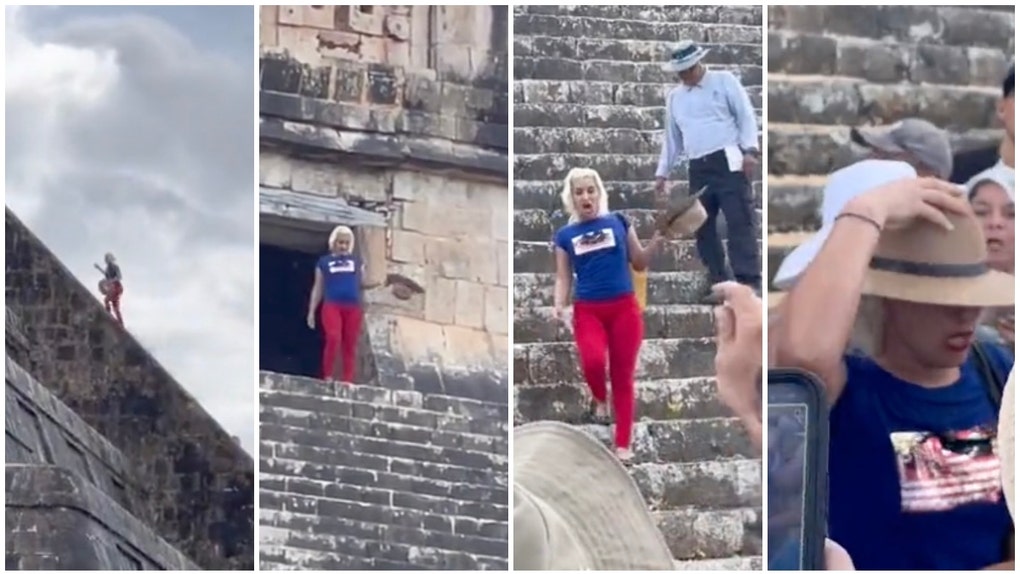 Tourist climbing Mayan Pyramid