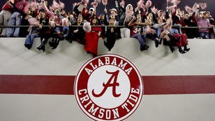 081314-CFB-Alabama-fans-cheer-after-the-Alabama-Crimson-Tide-PI.jpg