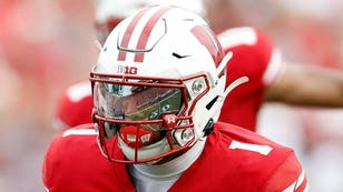 Wisconsin Badgers running back Chez Mellusi will return in 2023. (Photo by John Fisher/Getty Images)