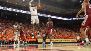 Auburn Tigers big Johni Broome dunks the ball on the Arkansas Razorbacks at Neville Arena in Auburn, Alabama.