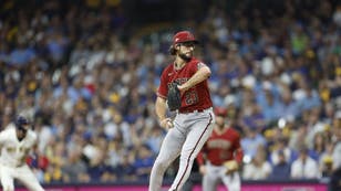 Arizona D-Backs RHP Zac Gallen delivers during the 1st inning vs. the Brewers during Game 2 of the 2023 NL Wild Card Series at American Family Field in Milwaukee, Wisconsin.