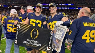 Michigan plauers celebrate the national championship win over Washington