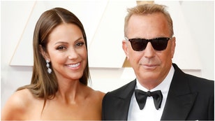 Kevin Costner's estranged wife Christine Baumgartner is vacationing in Hawaii with his friend. Their divorce has been messy. (Credit: Getty Images)