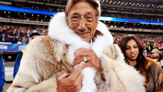 Image: Former Jets quarterback Namath points to his championship ring before the Seahawks play the Broncos in the NFL Super Bowl XLVIII football game in East Rutherford