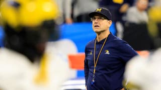 Michigan head coach Jim Harbaugh returned to the Wolverines sidelines during Big Ten title game, with Tony Petitti in attendance