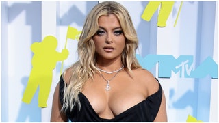 Bebe Rexha had her face jacked up Sunday night thanks to an idiot in the audience. She was hit by a phone. Watch the video. (Credit: Getty Images)