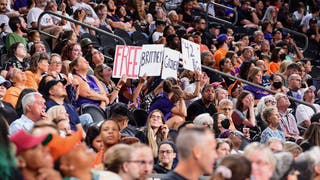 fans hold signs for Brittney Griner