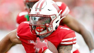 Wisconsin running back Chez Mellusi out indefinitely with a wrist injury. (Photo by John Fisher/Getty Images)