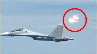 Chinese jets harass American planes. (Credit: Screenshot/Twitter Video https://twitter.com/meantweeting1/status/1714610196645806398/U.S. Government)