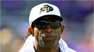 Deion Sanders' swagger doesn't slow down when he's on the recruiting trail. A recruit called him very cocky. (Credit: Getty Images)