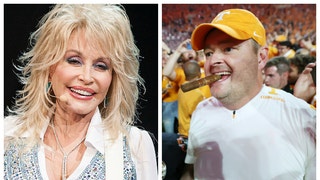 Country music singer Dolly Parton reacts to Tennessee beating Alabama 52-49. (Credit: Getty Images)