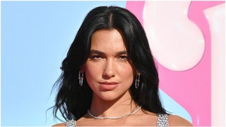 Dua Lipa went viral on Instagram with pictures of herself wearing a see-through white outfit. See the popular photos from Lipa. (Credit: Getty Images)