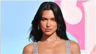 Dua Lipa appears to be enjoying herself on vacation. She went viral on Instagram with several bikini photos. See her best pictures. (Credit: Getty Images)