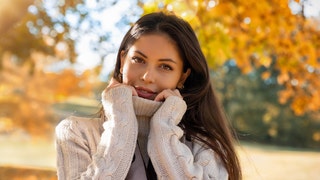 Woman in the park during autumn time