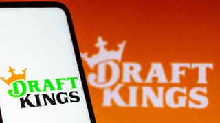 In this photo illustration the DraftKings logo seen