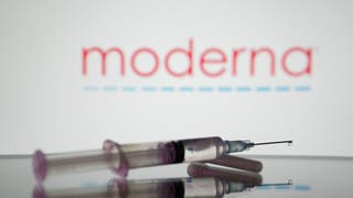 27275820-In this photo illustration, a medical syringe is displayed