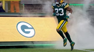 Aaron Jones of the Green Bay Packers is introduced before the game against the Cleveland Browns at Lambeau Field.