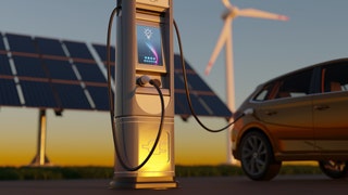 bf072f06-Electric car charging with wind turbines and solar panel