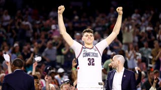Donovan Clingan of the UConn Huskies celebrates after defeating the Miami Hurricanes during the NCAA Men’s Basketball Tournament Final Four.