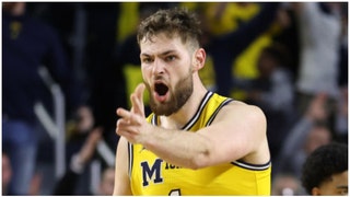 Hunter Dickinson claims it took courage to leave Michigan for Kansas. (Credit: Getty Images)