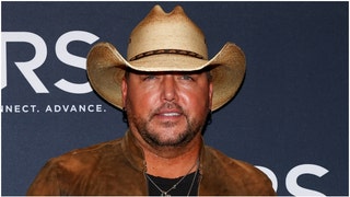 Jason Aldean had fans going crazy with a pro-America speech during a concert in Mansfield, Massachusetts. Watch a video of his comments. (Credit: Getty Images)