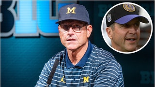 John Harbaugh reacted to his brother Jim and Michigan being caught up in a huge cheating scandal. Watch his comments. (Credit: Getty Images)