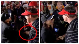 Georgia football coach Kirby Smart gives Jenny Dell an incredibly aggressive handshake. (Credit: Screenshot/Twitter Video https://twitter.com/gifdsports/status/1589031956255510528)