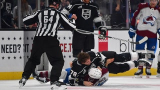 Kings Alex Laferriere fights the Avalanche player Logan O'Connor