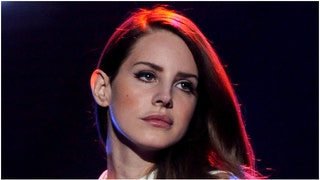 Lana Del Rey doesn't seem happy about being accused of have demonic powers gained through witchcraft. She hit back at witchcraft allegations. (Credit: Getty Images)