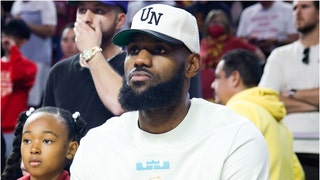 LeBron James showed no interest in standing with respect for the national anthem during a USC game. He didn't stand. Watch the video. (Credit: Getty Images)
