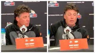 Mike Gundy gets chippy with reporter following bowl loss to Wisconsin when asked about staff changes. (Credit: Screenshot/Twitter Video https://twitter.com/Ben_Hutchens_/status/1608001272585793537)