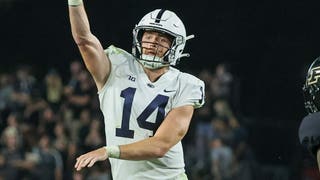 Penn State quarterback Sean Clifford scores five touchdowns against Purdue. (Photo by Michael Hickey/Getty Images)