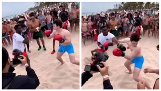 eb989806-Spring-Breaker-Knocked-Out-Cold-During-Beach-Boxing-Match
