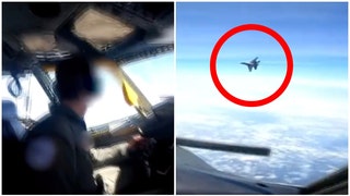 Insane video shows Chinese fighter jet intercepting American spy plane. (Credit: Screenshot/Twitter Video https://twitter.com/lucasfoxnews/status/1663634937277304832)