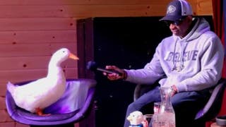 Deion Sanders chats with Mark Johnson during his Colorado coach's show on Wednesday, sitting next to the Aflac duck. Courtesy of Colorado Athletics