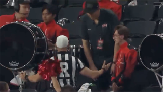 mountain-west-referee-steve-baron-run-into-stands-unlv-band