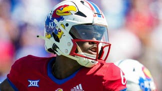 Kansas Jayhawks QB Jalon Daniels returns to practice in a limited role. (Photo by Jay Biggerstaff/Getty Images)