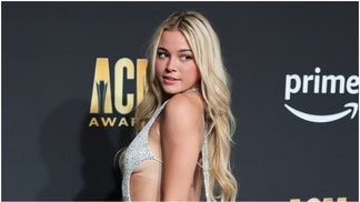 Olivia Dunne is pro-dog. She posted a viral TikTok video of her new puppy. Why are dogs better than cats? The reasons are simple. (Credit: Getty Images)