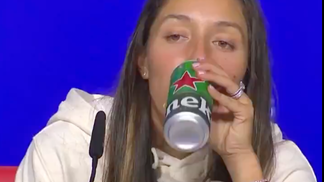Tennis player Jess Pegula drinking beer